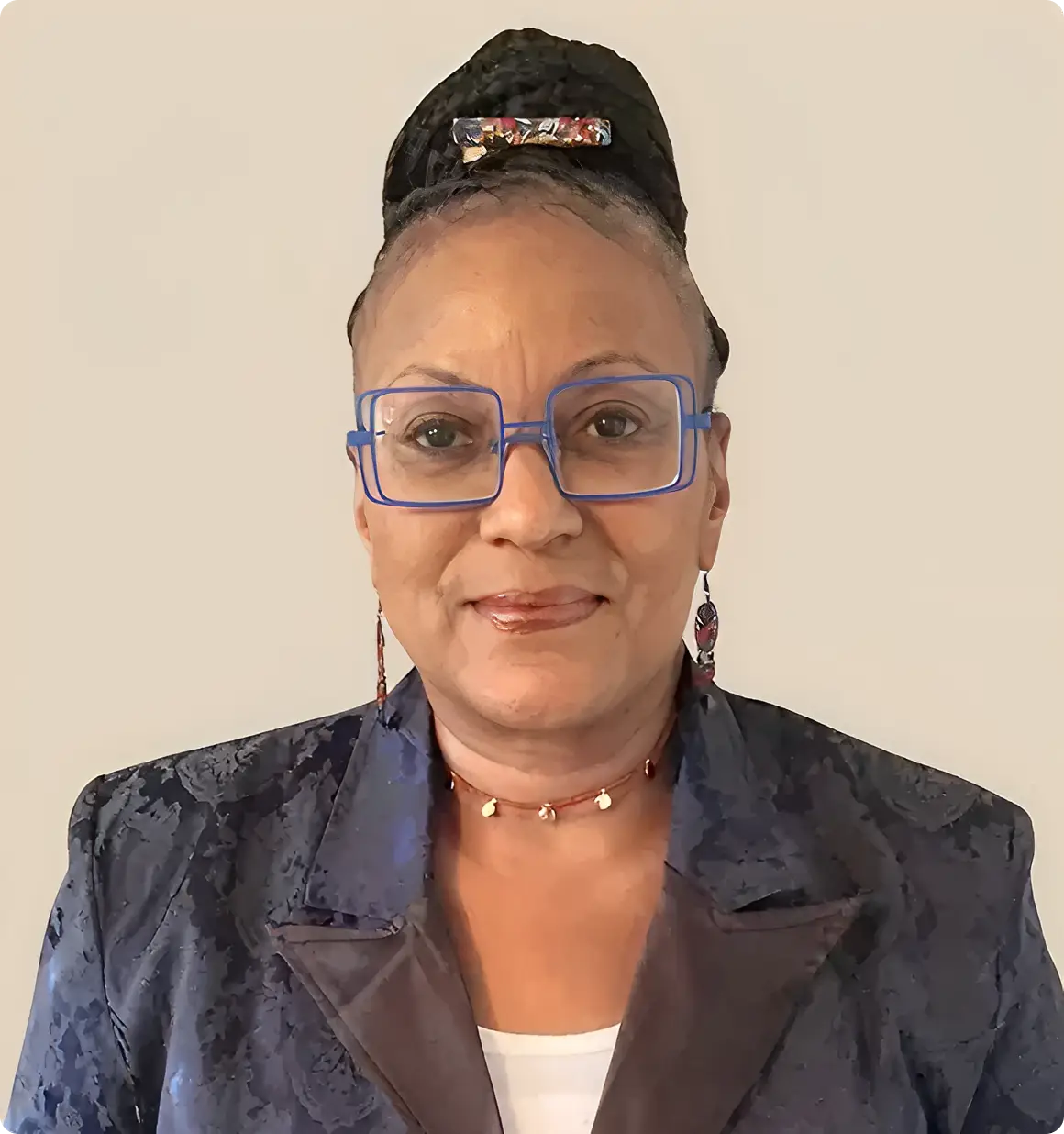 Woman wearing blue glasses and jacket