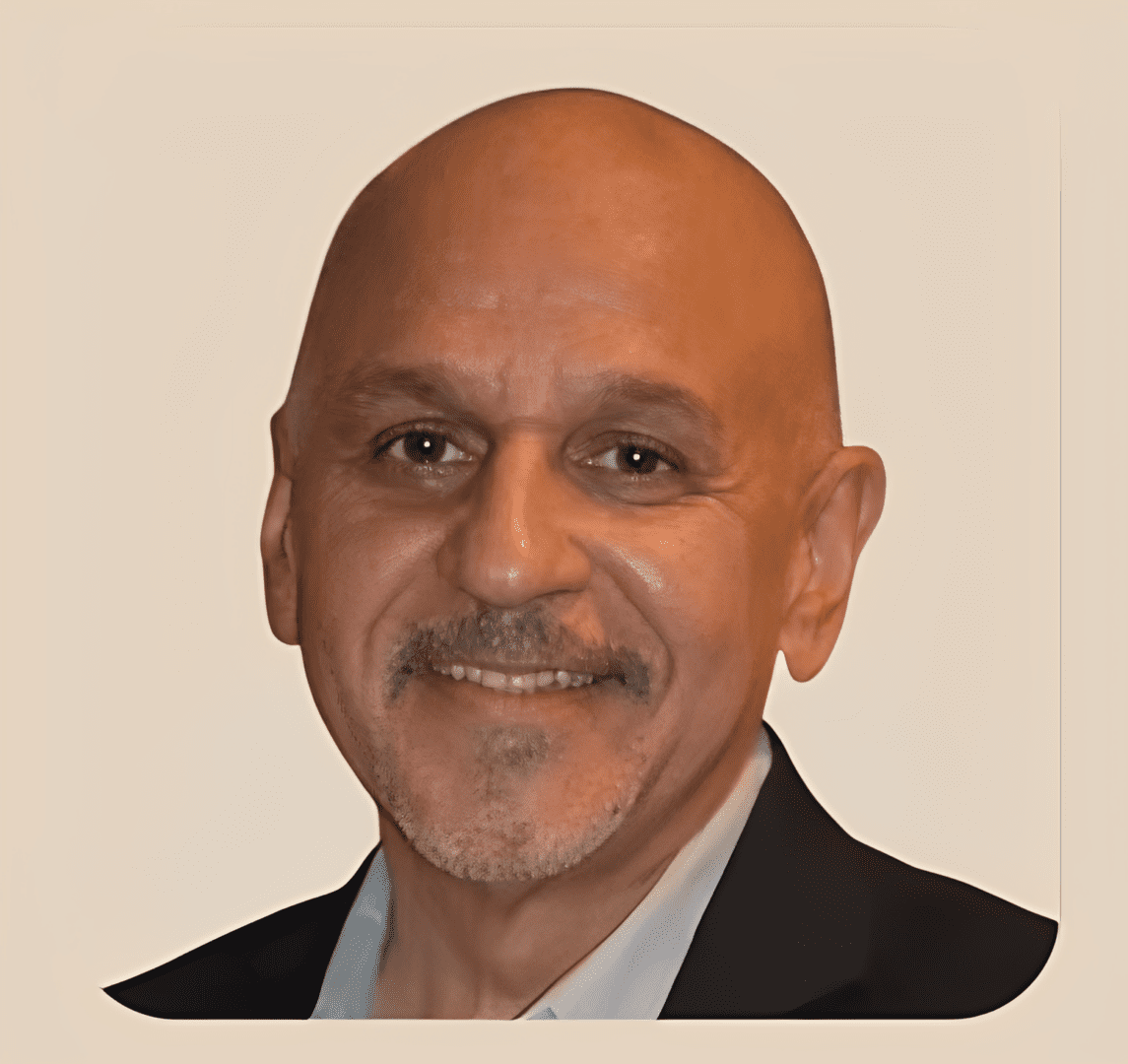 Bald man with goatee smiling warmly