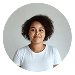 Person standing against a plain background