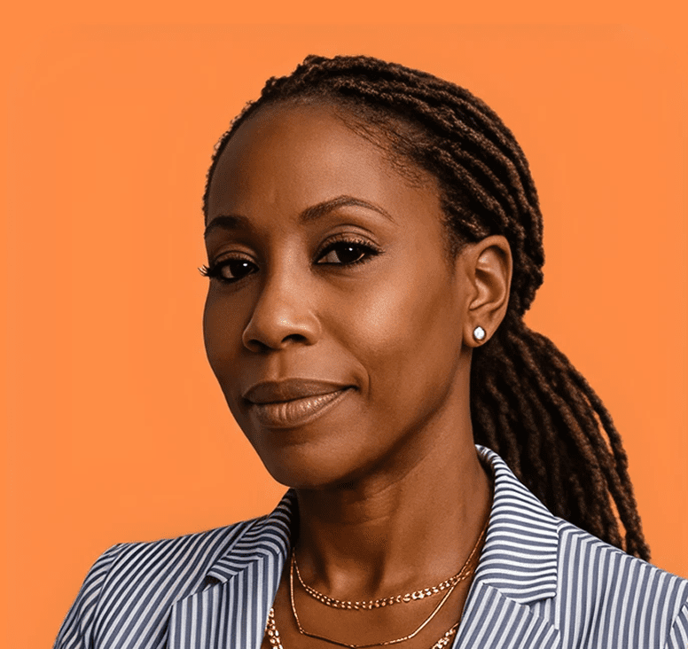 Woman with braids against orange background
